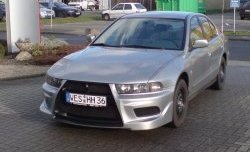 11 099 р. Передний бампер Evo style Mitsubishi Galant 8  дорестайлинг седан (1996-1998) (Без сетки, Неокрашенный)  с доставкой в г. Вологда. Увеличить фотографию 3