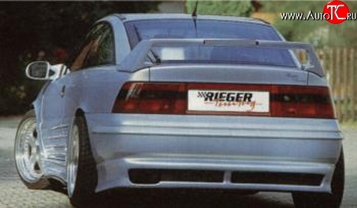 4 499 р. Накладка заднего бампера Rieger Opel Calibra A (1990-1997)  с доставкой в г. Вологда