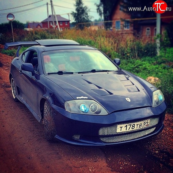 9 649 р. Передний бампер Aston Hyundai Coupe (2002-2008) (Неокрашенный)  с доставкой в г. Вологда