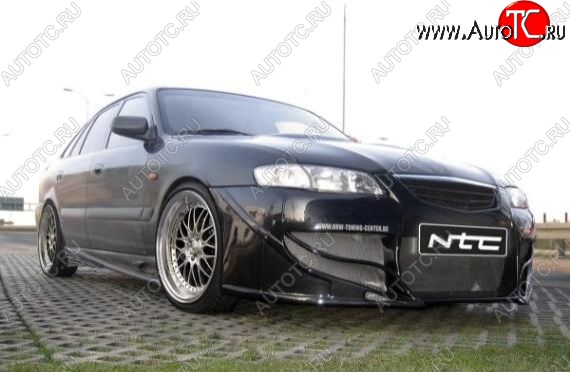 25 899 р. Передний бампер NTC Mazda 626 GF дорестайлинг седан (1997-1999)  с доставкой в г. Вологда