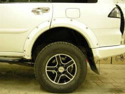 15 349 р. Накладки на колёсные арки BUSHWACKER Mitsubishi Pajero Sport PB дорестайлинг (2008-2013) (Неокрашенные)  с доставкой в г. Вологда. Увеличить фотографию 3