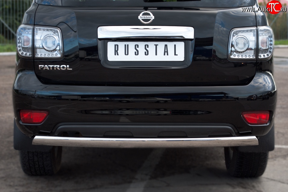11 599 р. Защита заднего бампера из овальной трубы диаметром 75x42 мм Russtal Nissan Patrol 6 Y62 дорестайлинг (2010-2014)  с доставкой в г. Вологда