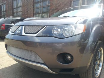 3 299 р. Защитная сетка в бампер (низ, ячейка 3х7 мм) Alfeco Стандарт Mitsubishi Outlander XL (CW)  дорестайлинг (2005-2009) (Хром)  с доставкой в г. Вологда. Увеличить фотографию 3