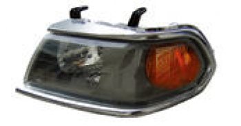 Левая фара (c электрокорректором) BODYPARTS Mitsubishi Pajero Sport  PA (1996-2004) дорестайлинг